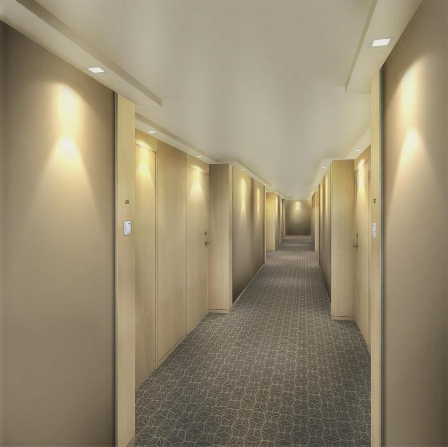 Seda Vertis North Cidade Quezon Exterior foto A typical hotel corridor